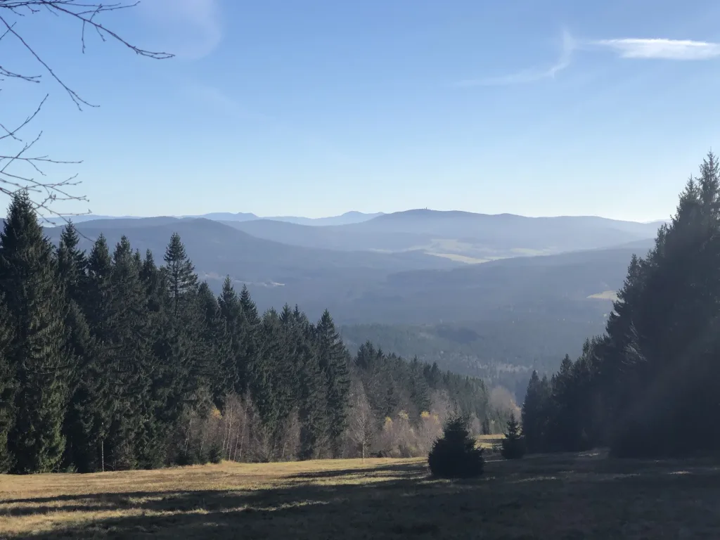 View over the wooded hills of the Bavarian Forest to the horizon