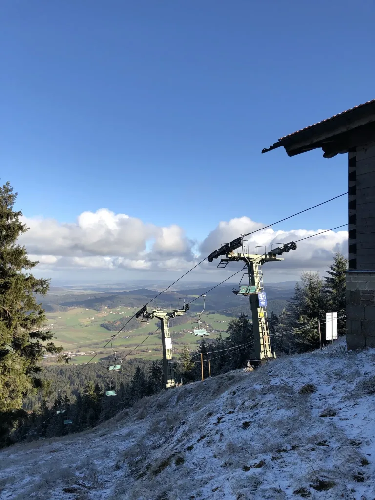 Top station of a ski lift with a view into the valley