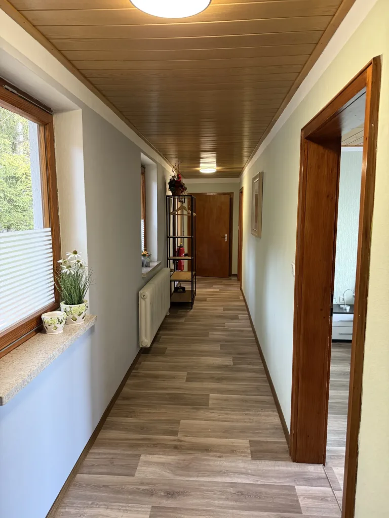 Hallway of the holiday apartment with a wooden ceiling