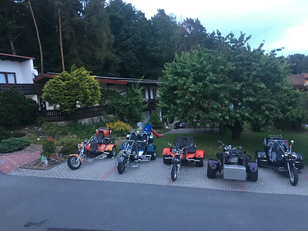 Trikes parked in front of the Landhotel