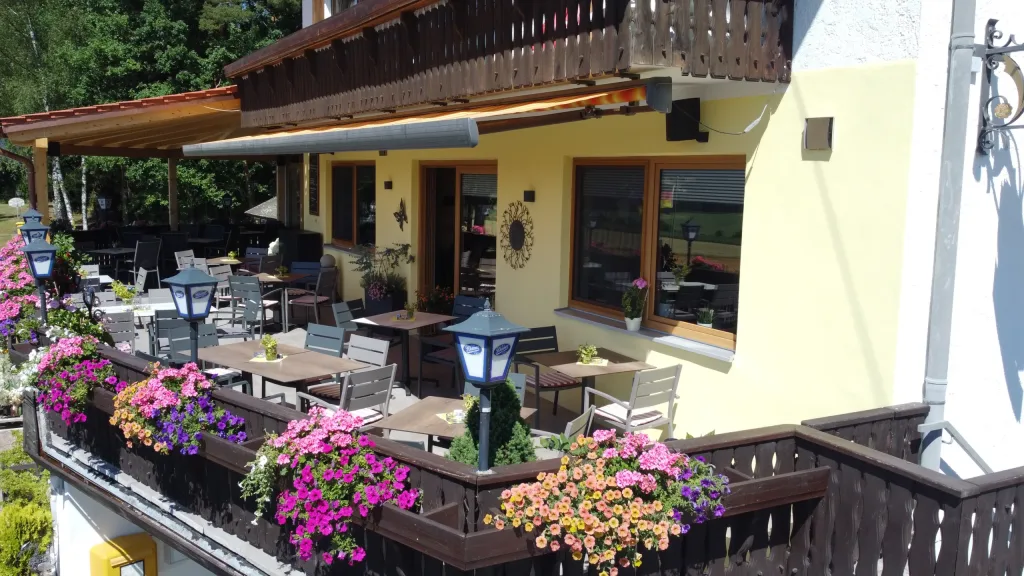 The restaurant's sun terrace decorated with flowers